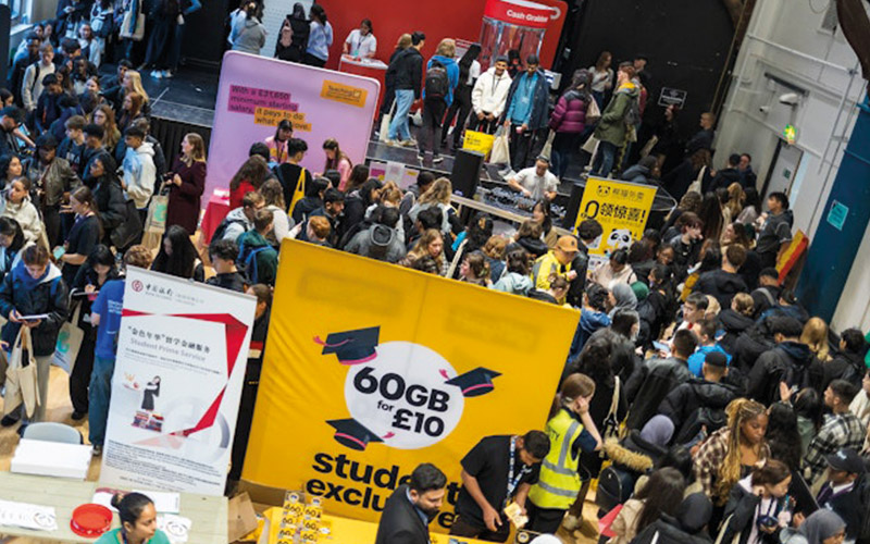 an image of students in Deb Hall with commerical stalls